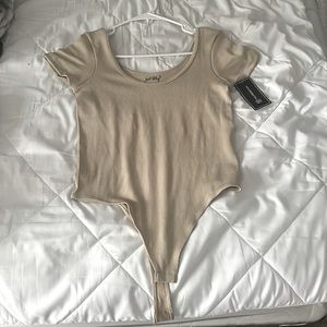 Just Polly Fashion Nova bodysuit! In LARGE